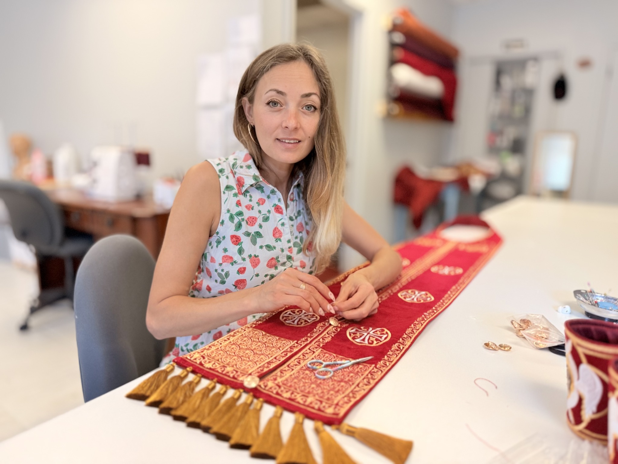 Yana hand-finishing an epitrachelion in our Florida atelier